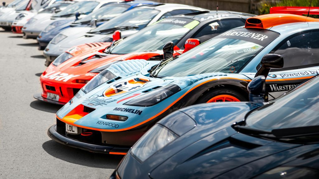 A vibrant lineup of classic and supercars showcasing style and speed, perfect for auto enthusiasts.